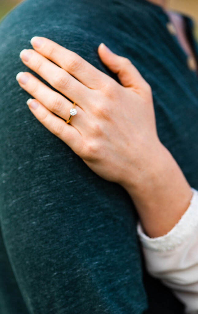 Close-up of an engagement ring during an engagement session