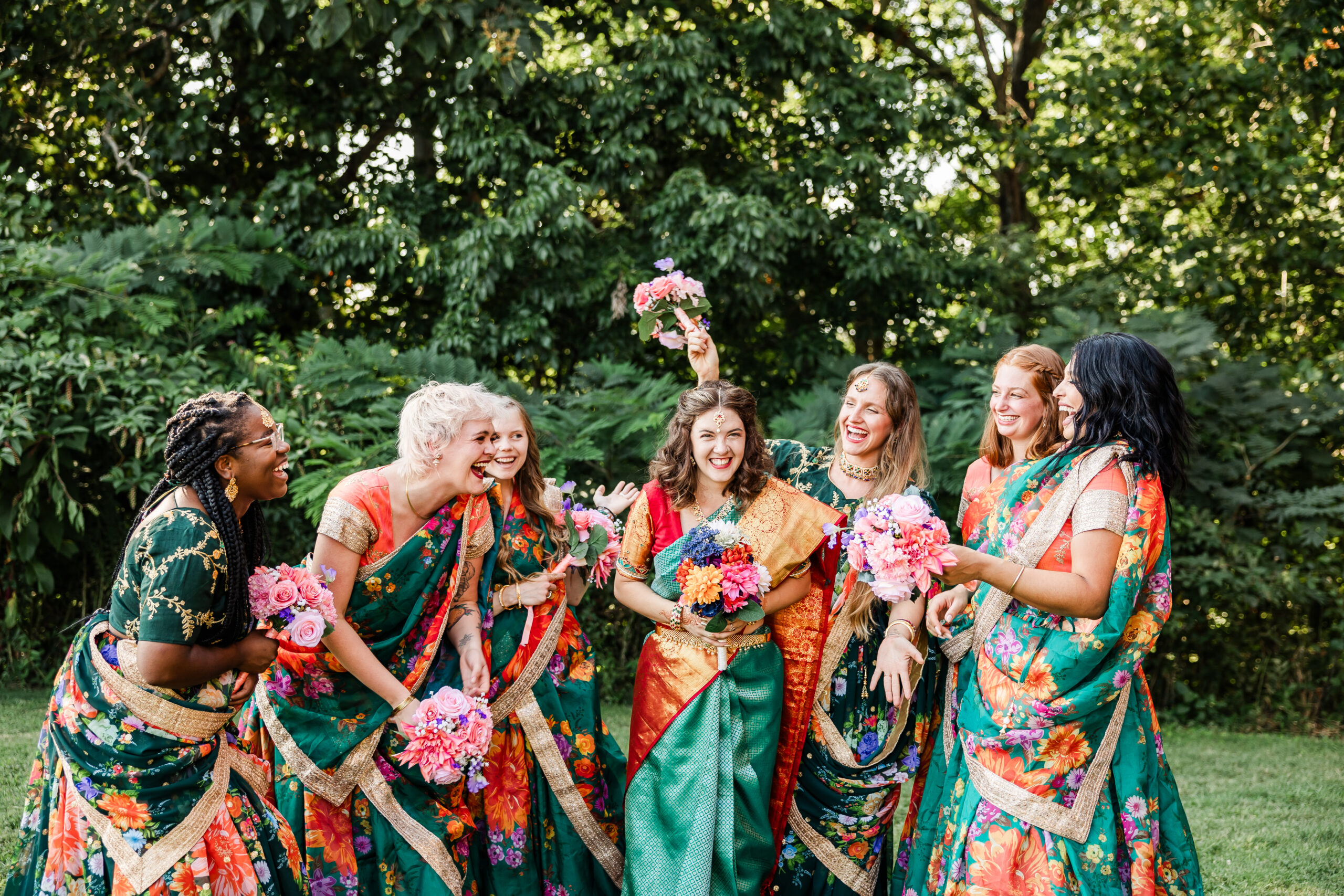Bride surrounded by her bridesmaids