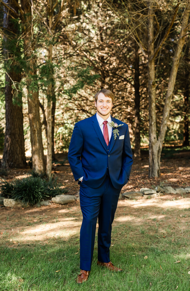 Full body portrait of groom at Annabella at Cedar Glen in Huntsville, AL