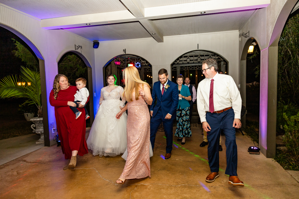 Guests out on the dance floor during a wedding reception in Huntsville, AL