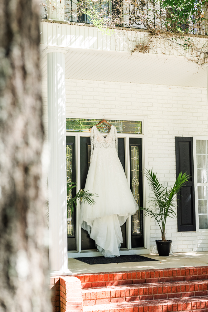 Dress hanging from the front door at Annabella at Cedar Glen