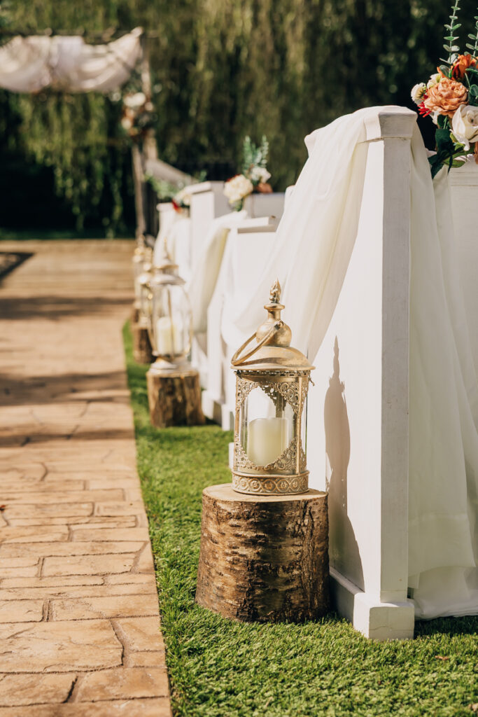 Outdoor ceremony decor in the aisle
