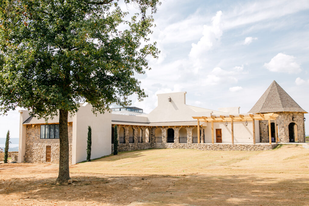 Exterior view of the Grand Hall at Stone Haven wedding venue in Section, Alabama.