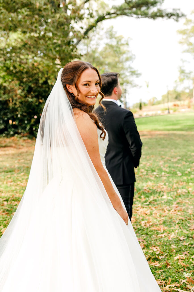 Bride moments before her first look with her soon-to-be husband at Stone Haven in Section, AL