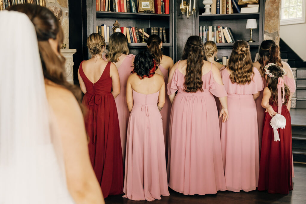 Bride about to do a first look with bridesmaids at Stone Haven in Section, AL