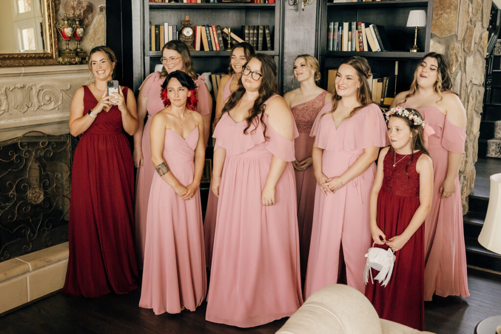 Bridesmaids reacting to seeing the bride in her wedding dress at Stone Haven in Section, AL