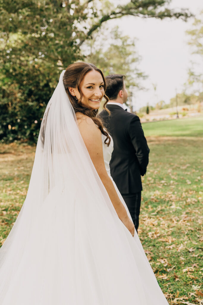 Bride moments before her first look with her soon-to-be husband at Stone Haven in Section, AL