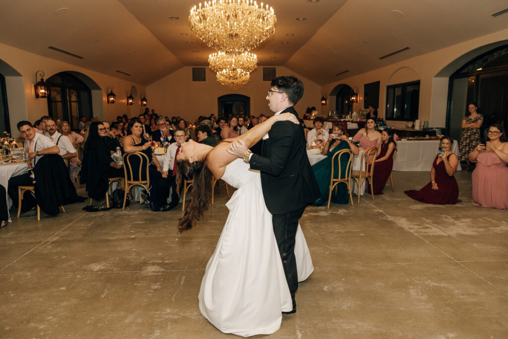 Bride and groom sharing their first dance in the Grand Hall at Stone Haven.