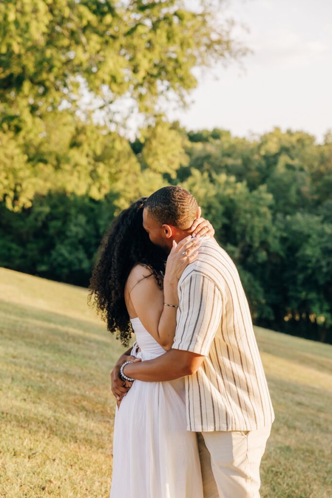 Newly engaged couple hugging at Arrington Vineyards after proposal