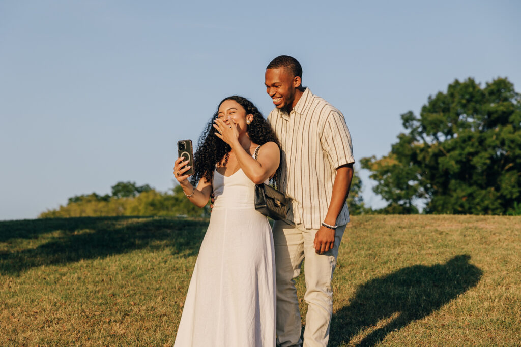 Sharing engagement news over FaceTime at Arrington Vineyards