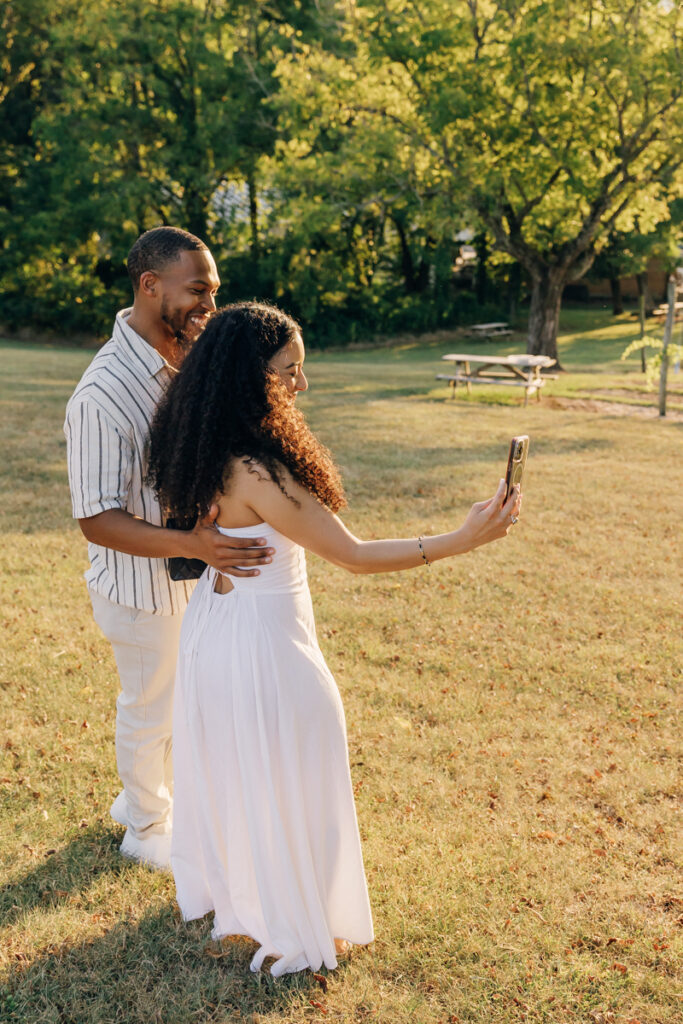 Engaged couple on video call after proposal at Arrington Vineyards