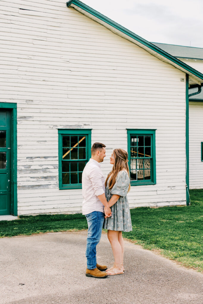 Couple holding hands and gazing lovingly into each other’s eyes
