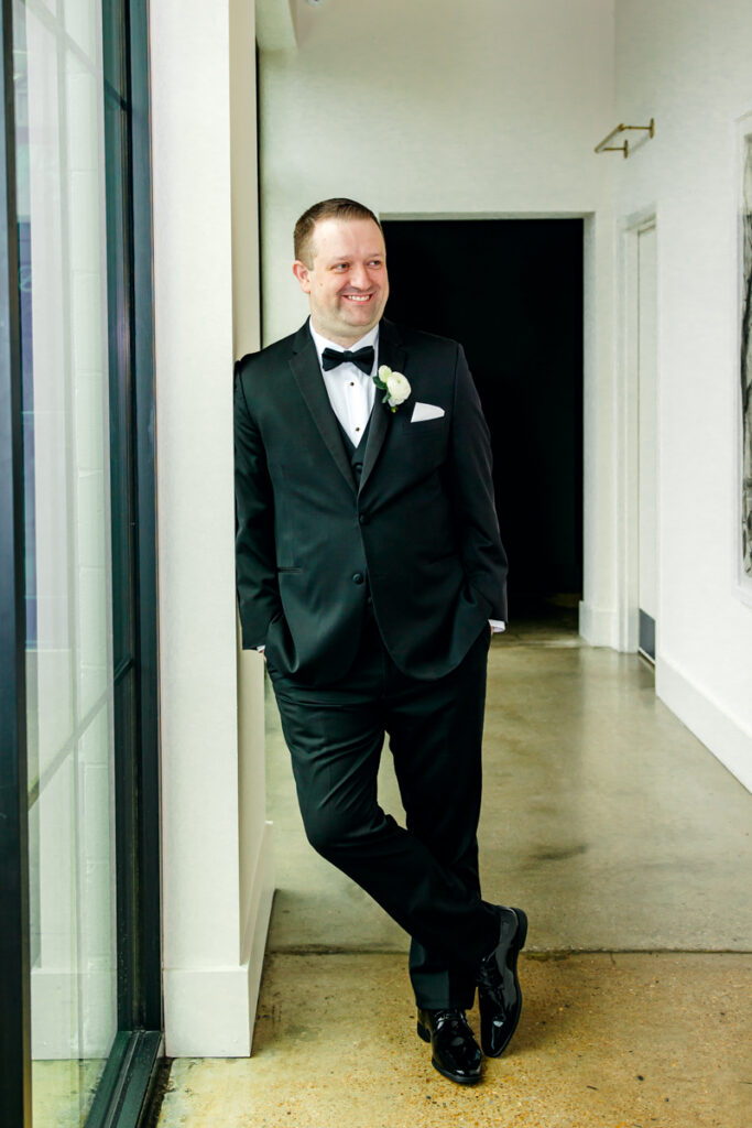 Groom portraits at Saint Elle winter wedding