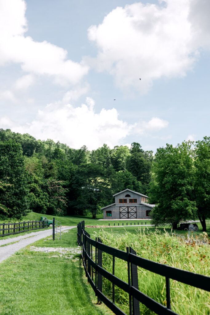 Distant view of 4 Points Farm from the long gravel driveway