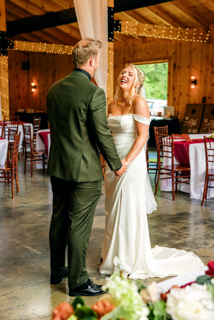 Bride sharing a joyful laugh with her soon-to-be husband