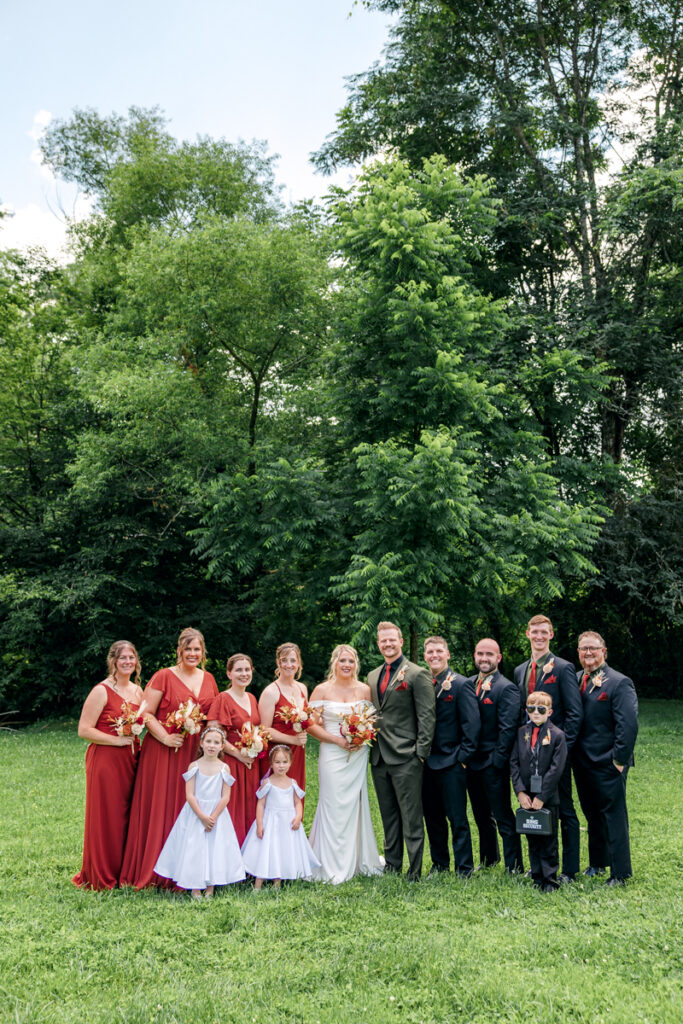Bride and groom with their wedding party at 4 Points Farm