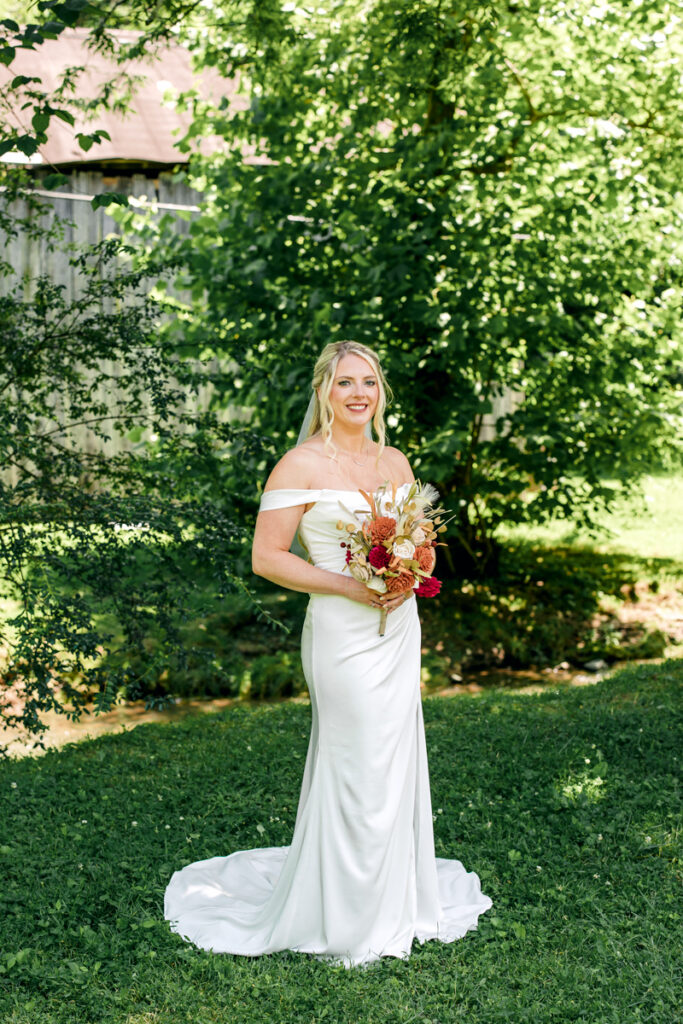 Full body portrait of the bride smiling at 4 Points Farm