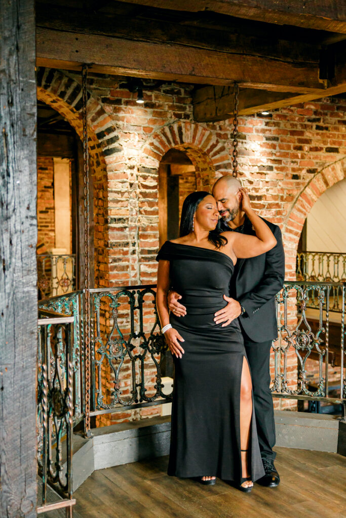 Elegant Nashville engagement session featuring a stylish couple dressed in black formal wear