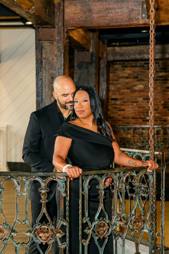 Engaged couple on the balcony at The Bedford in Nashville
