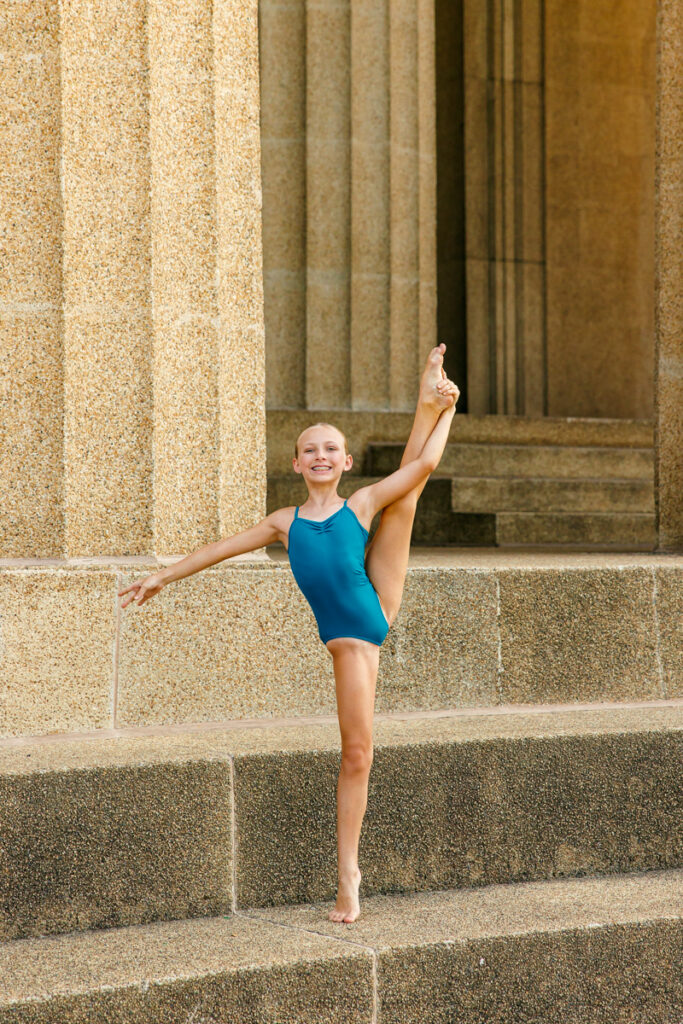 Young dancer showcasing her side leg extension