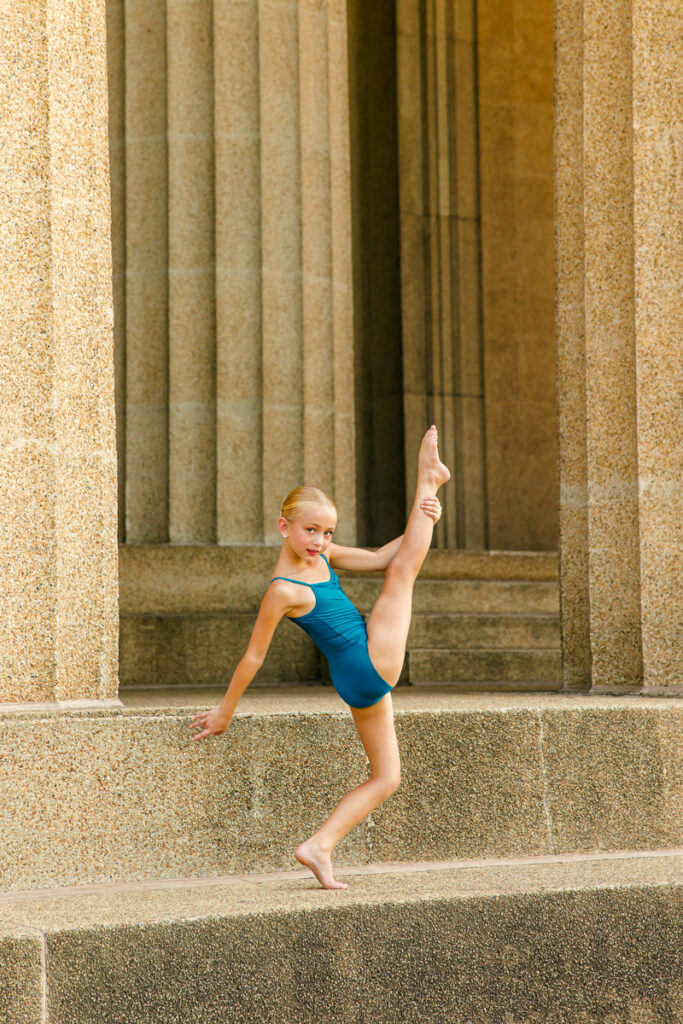 Dance portrait highlighting a front leg extension