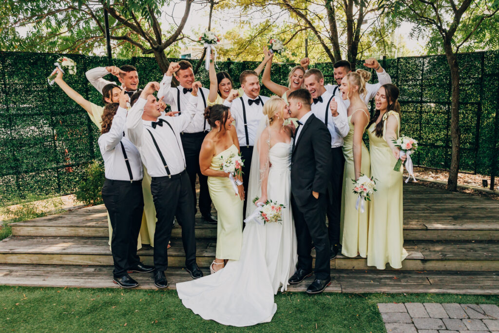 Bride and groom with their full wedding party at The Reserve at Fat Bottom Brewery