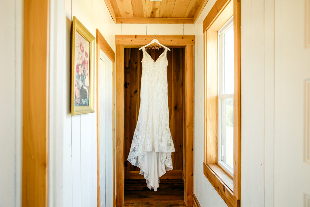 Bride's dress hanging at Allenbrooke Farms in Spring Hill, TN