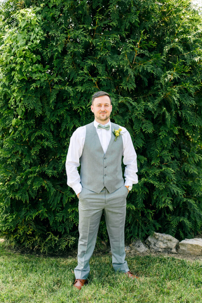 Groom portraits during a wedding day at Allenbrooke Farms