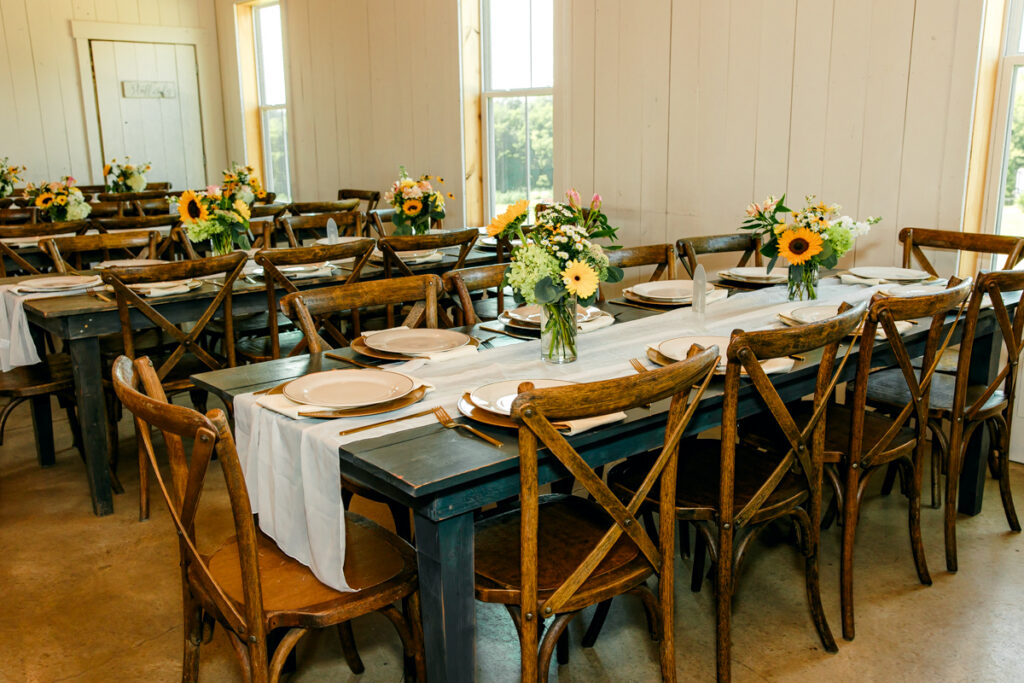 Reception table setup for a wedding at Allenbrooke Farms