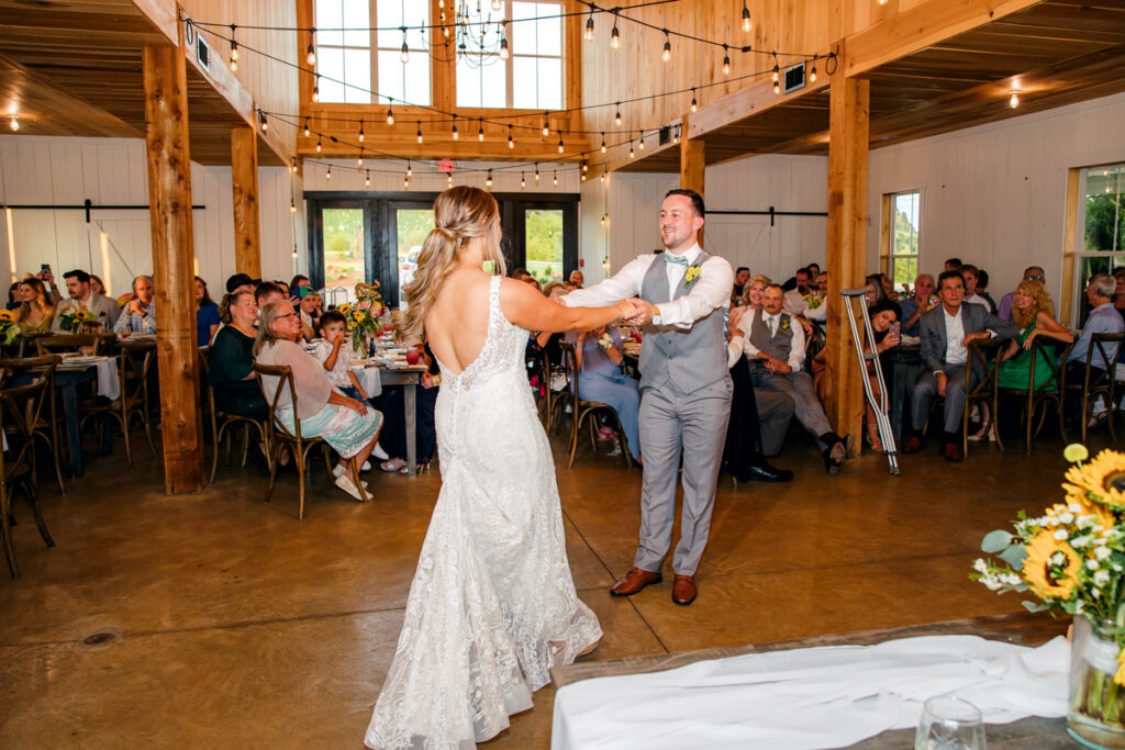 Bride and groom share their first dance during their reception at Allenbrooke Farms