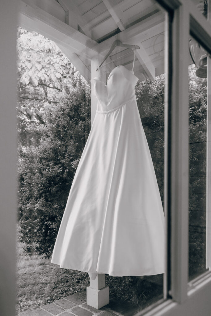 Bride's dress hanging at the bridal suite at Homestead Manor in TN