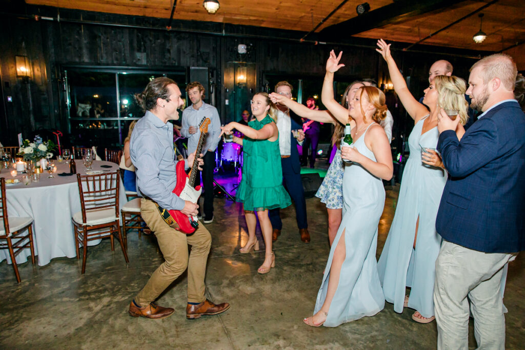 Guests enjoying the live music during wedding reception