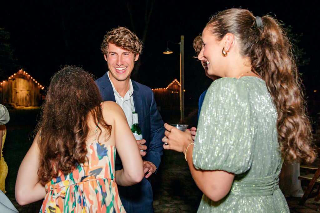 Guests laughing together at Homestead Manor wedding reception