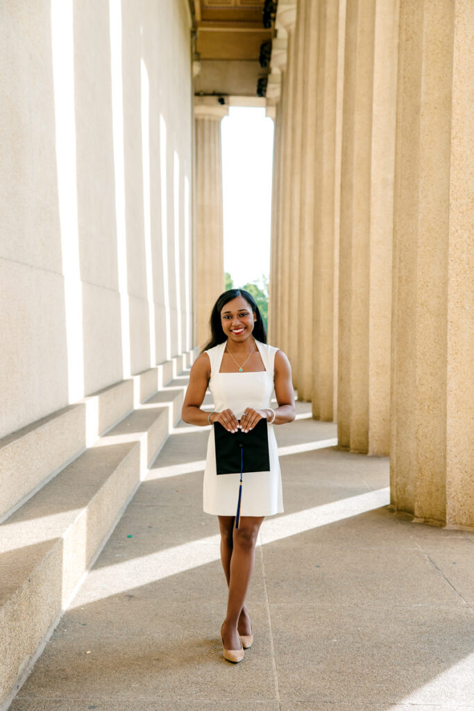 Nashville college senior holding on to her graduation cap
