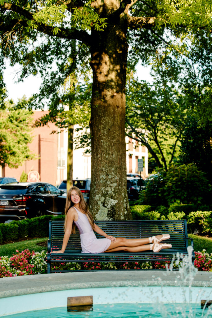 Ballet dancer lounging on a bench in Franklin, Tennessee